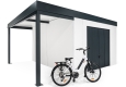 Garden house with Hormann garage door and left carport for bicycle